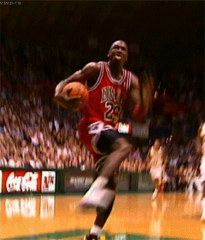 Michael Jordan slam dunking a basketball